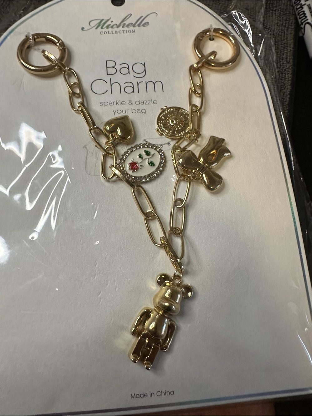 Gold-Tone Charm Bracelet with Enamel Rose Accent